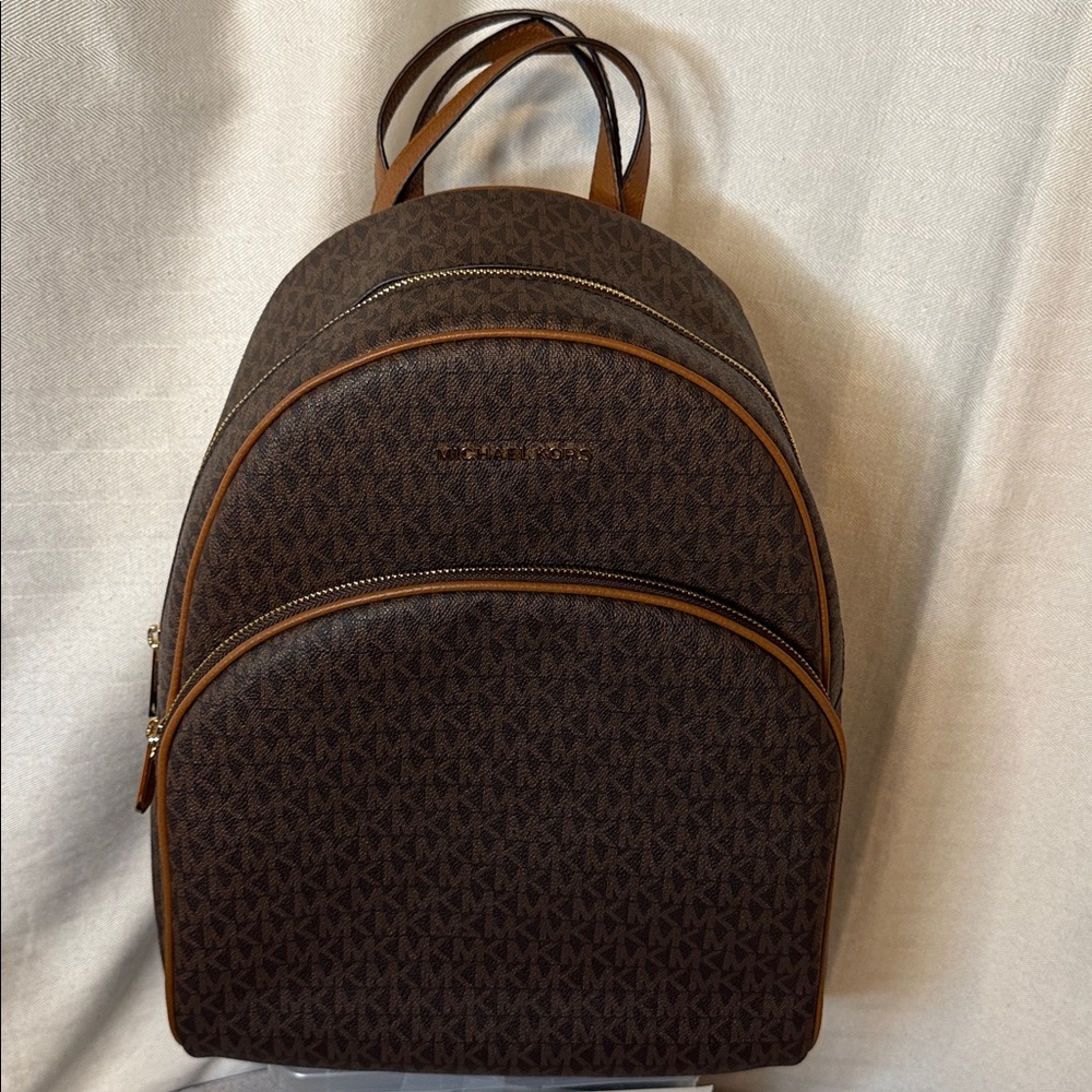 NWT. Michael Kors ABBEY Logo Backpack (BROWN ). Beautiful full size MK backpack.